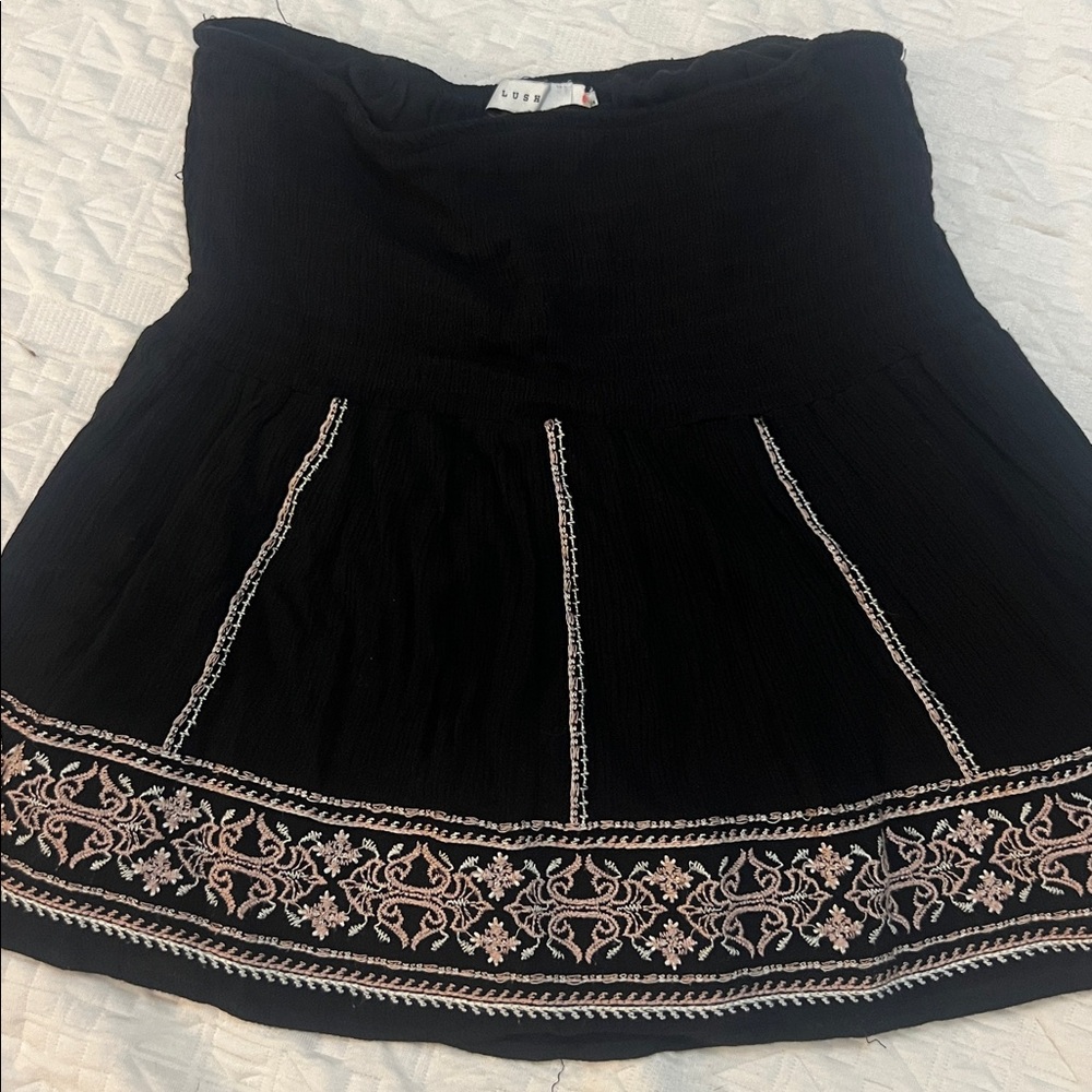 Lush Black Top with White Accents